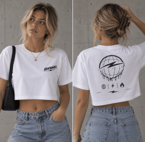 A woman models a white crop top with "HEATWAVES" on the front and a dripping globe design on the back.