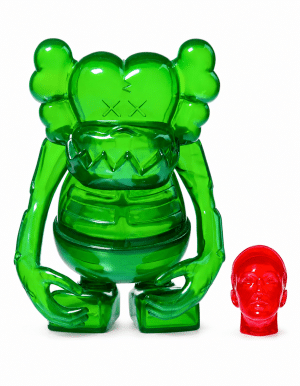 A translucent green KAWS "Companion" figure with "XX" eyes stands next to a small red translucent head.