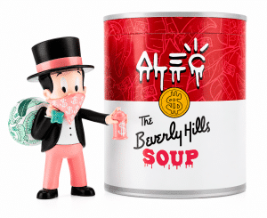 A Monopoly Man figurine with a dollar-sign bandana and money bag stands next to a "The Beverly Hills SOUP" can.