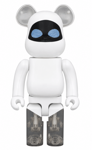 A white Bearbrick figure with mouse ears, a black face, blue striped eyes, and clear lower legs showing internal mechanisms.