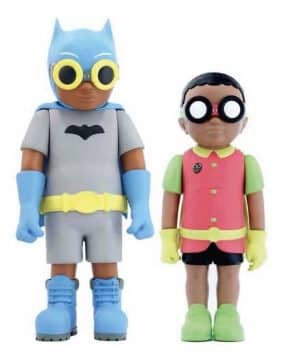 Two dark-skinned action figures, one dressed as Batman and the other as Robin, stand side-by-side.