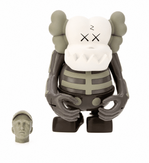 A KAWS Companion figure with a white skull face, "XX" eyes, and a gray skeleton body, next to a small gray head.