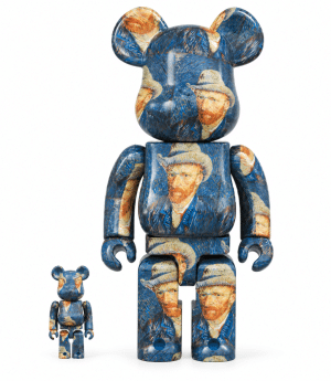 Two Be@rbrick figures, one large and one small, are covered in Van Gogh's "Self-Portrait with Straw Hat."