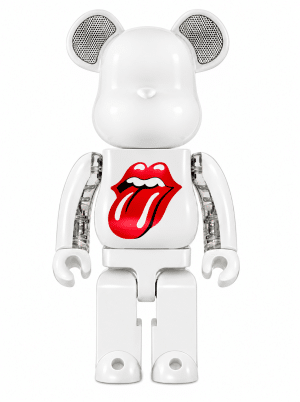 A white Bearbrick figure with mouse-like ears and the red "Rolling Stones" tongue logo on its chest.
