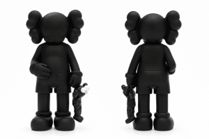 A black KAWS Companion toy with "XX" eyes, holding a smaller black toy, shown from front and back.