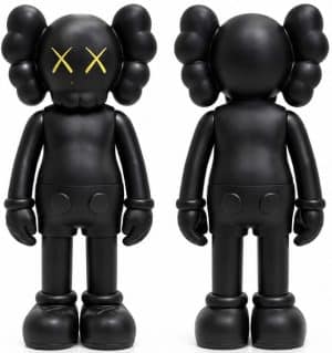 A black KAWS Companion figure is shown from the front and back, with yellow "XX" eyes.